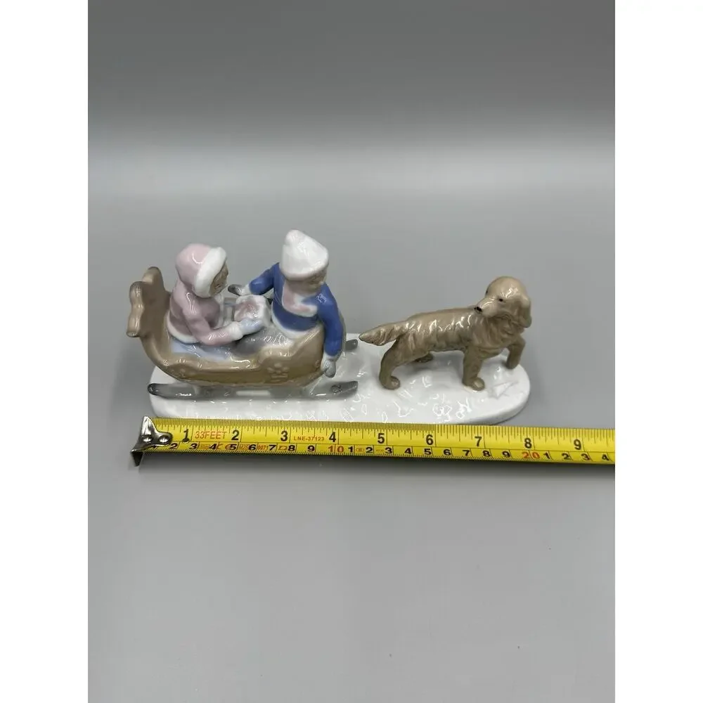 Meico Figurine Boy & Girl Sled Retriever Dog Snow Winter Porcelain Figurine 8”